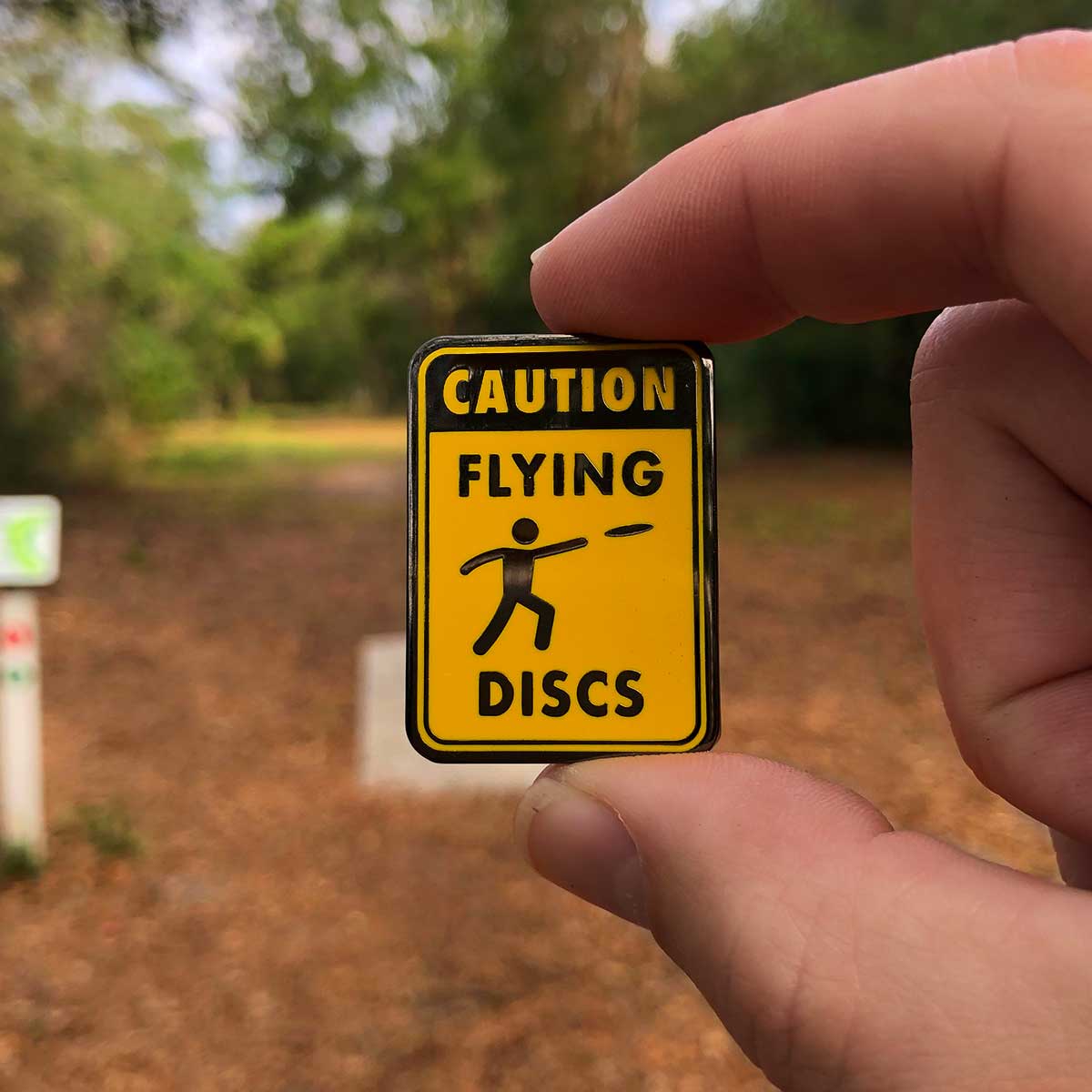 Caution Flying Discs Disc Golf Pin fingers